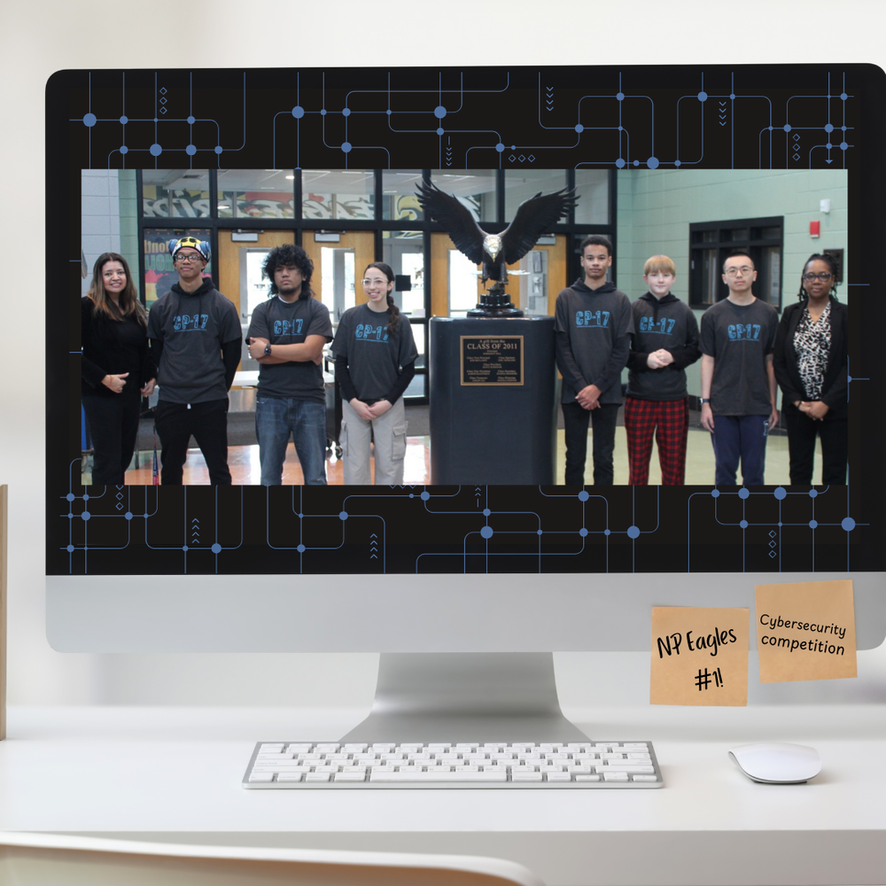 students posing for picture on a laptop