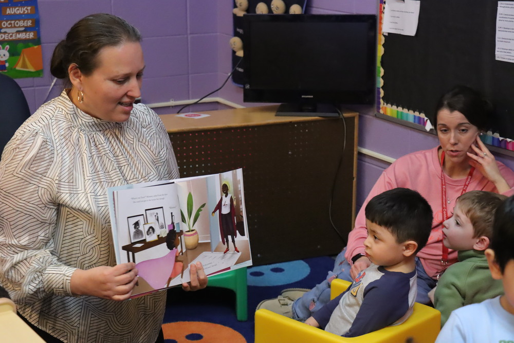 Dr Navarro reading to children