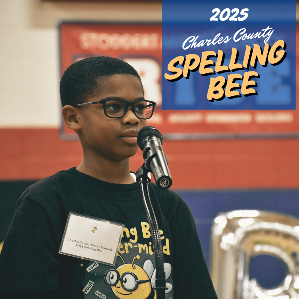 student standing in front of microphone
