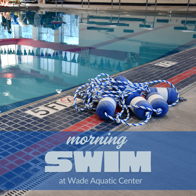 the edge of an indoor swimming pool with a rope