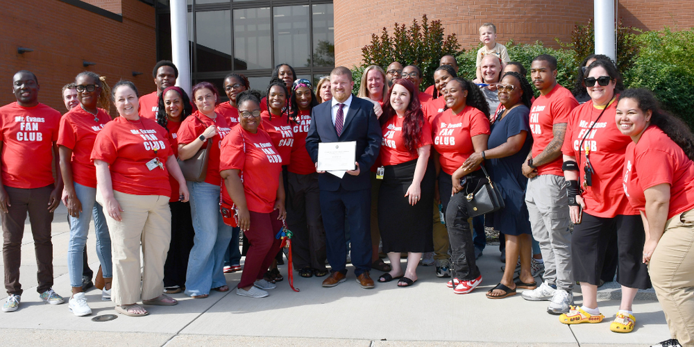 Evans with Stoddert staff 