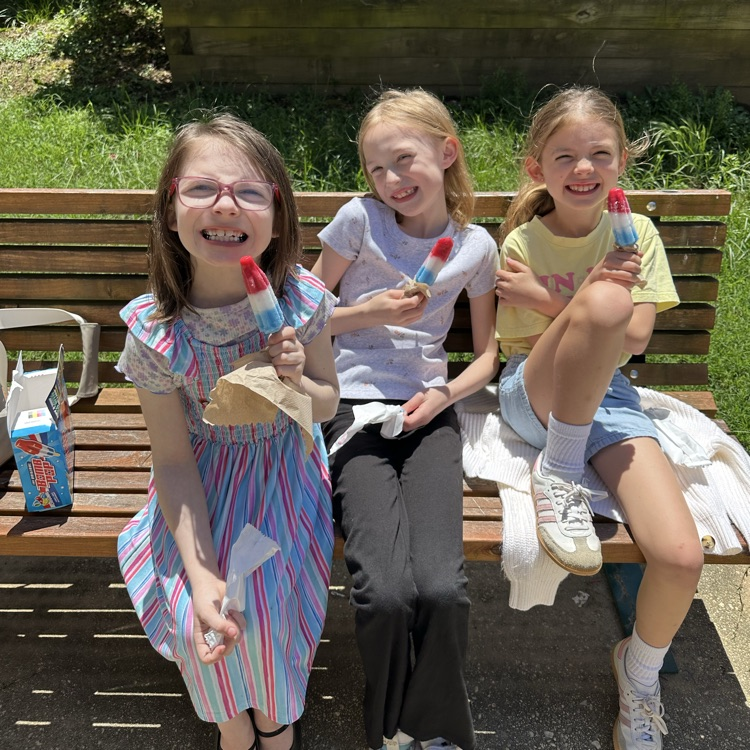 students eating a popsicle