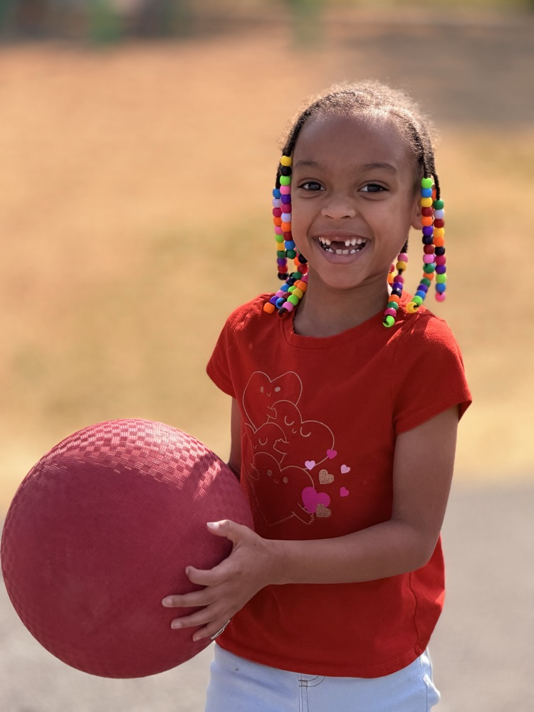 child with ball