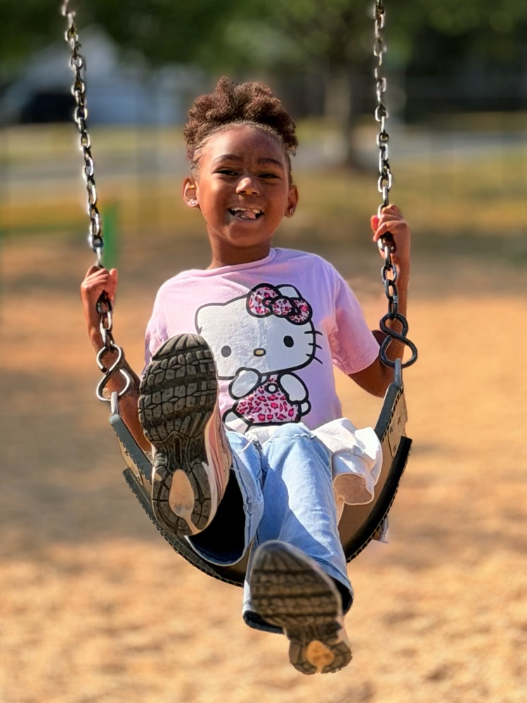 child on swing
