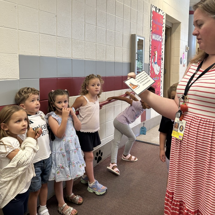 students finding a clue at the music room