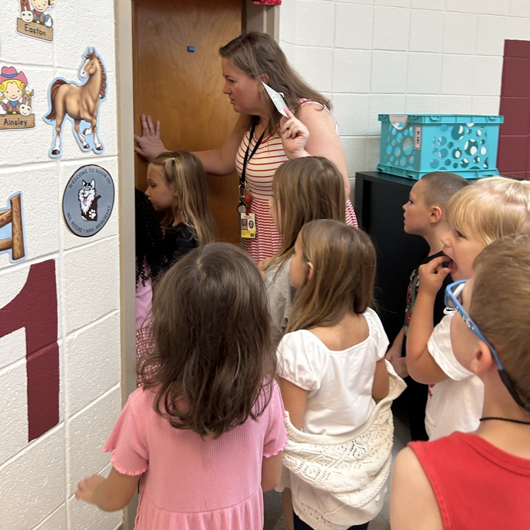 students back at their classroom for the final clue