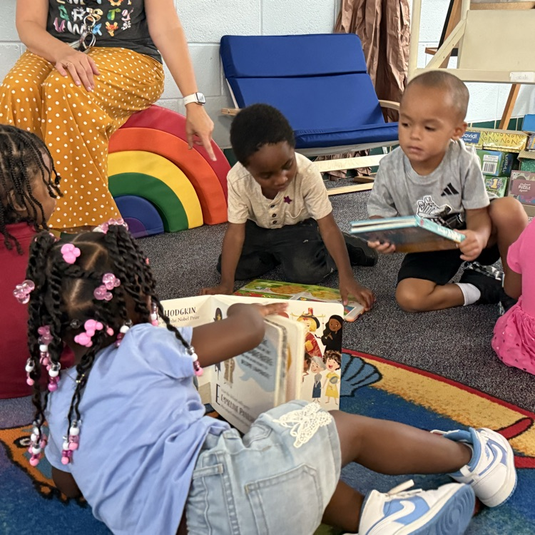 3 year olds enjoying the new board books