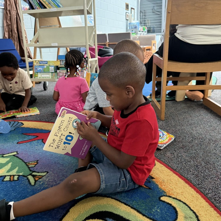3 year olds enjoying the new board books