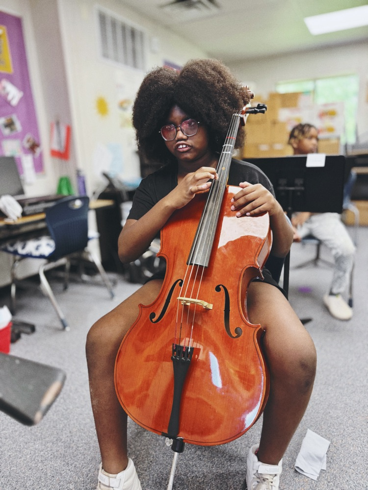 student playing instrument 