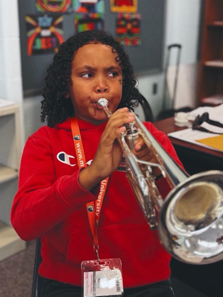 student playing instrument 