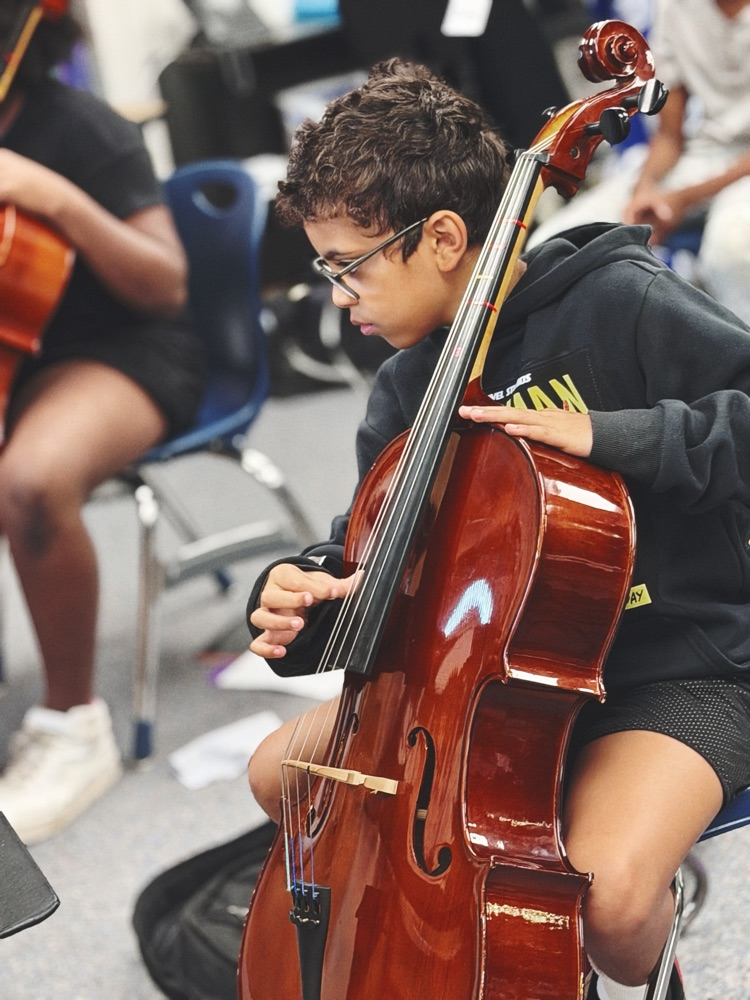 student playing instrument 