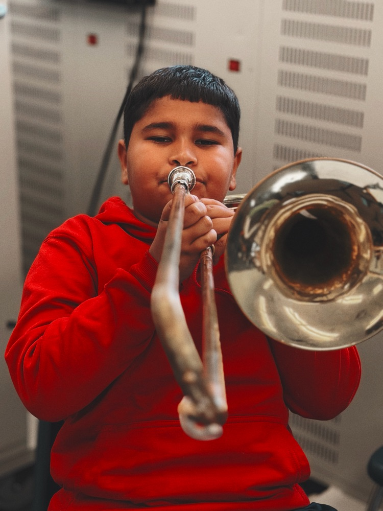student playing instrument 