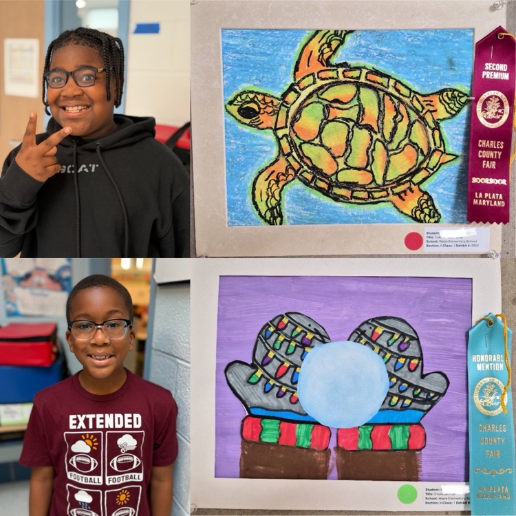 students with their artwork. 