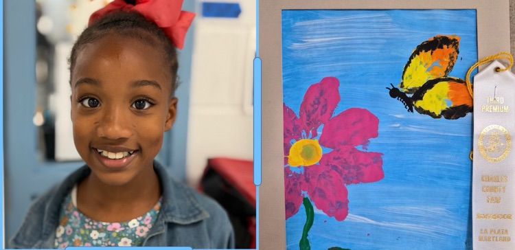 students with their artwork. 