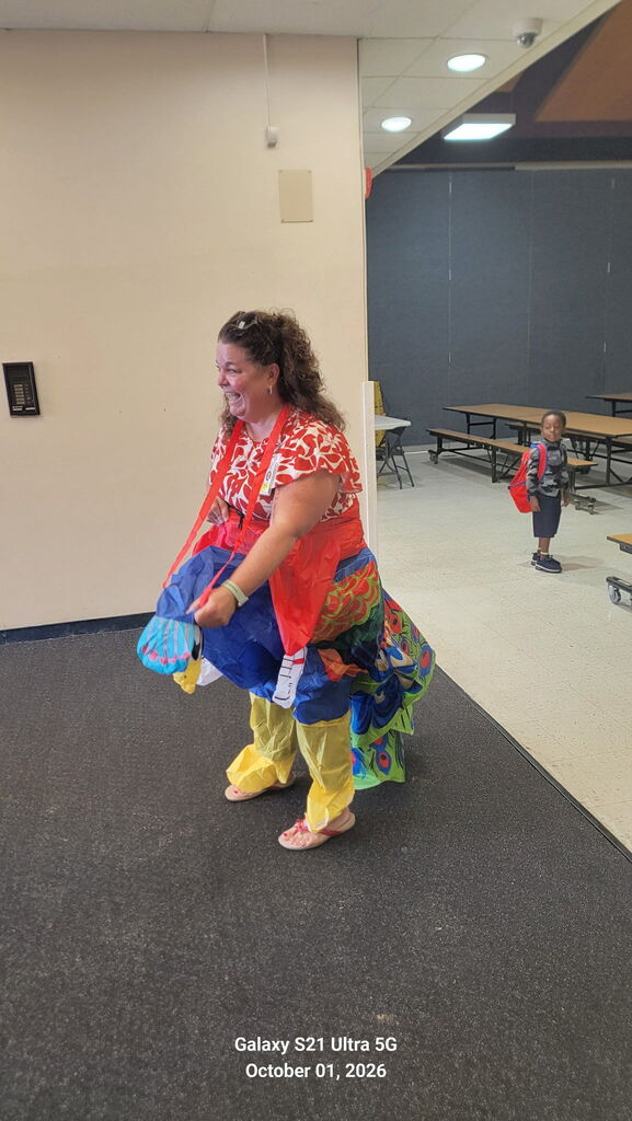 Ms. Blandford Greeting Students for the October 1 Attendance kickoff.