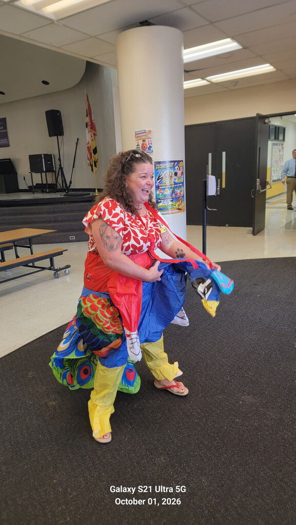 Ms. Blandford Greeting Students for the October 1 Attendance kickoff.