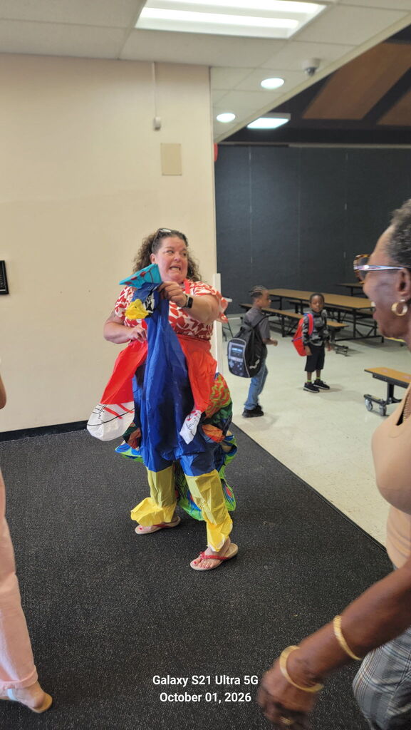 Ms. Blandford Greeting Students for the October 1 Attendance kickoff.