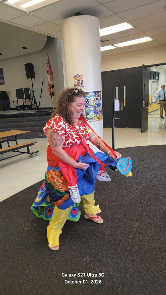 Ms. Blandford Greeting Students for the October 1 Attendance kickoff.