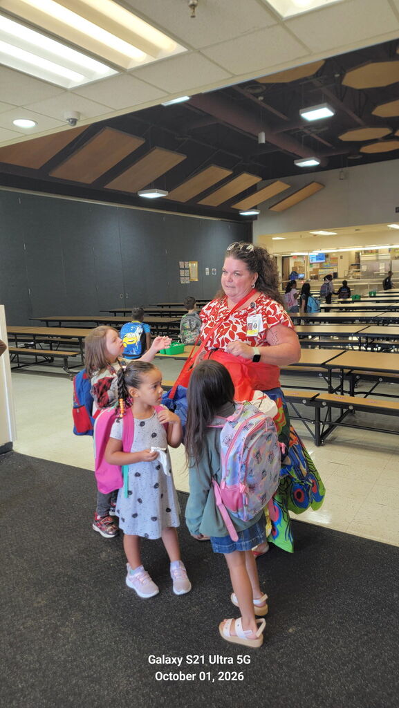 Ms. Blandford Greeting Students for the October 1 Attendance kickoff.