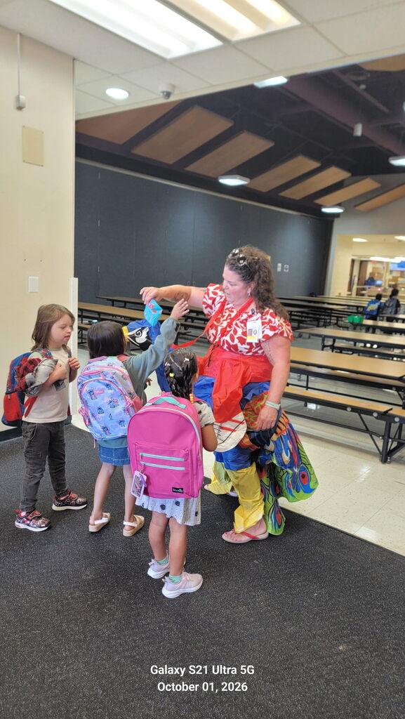 Ms. Blandford Greeting Students for the October 1 Attendance kickoff.