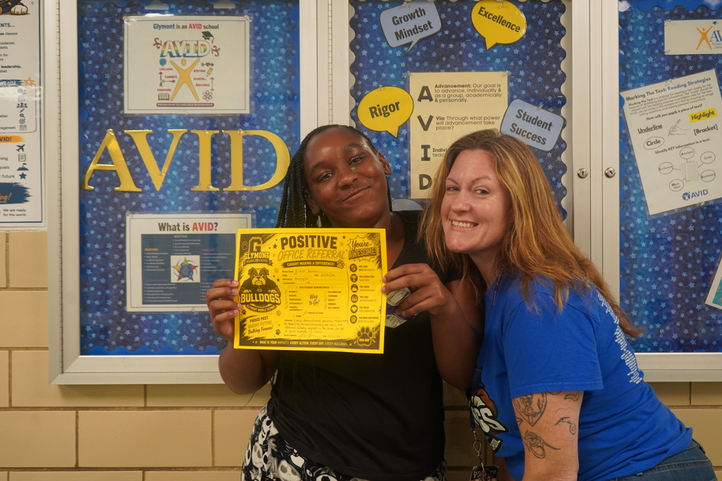 Ms Echard with positive office referral recipient