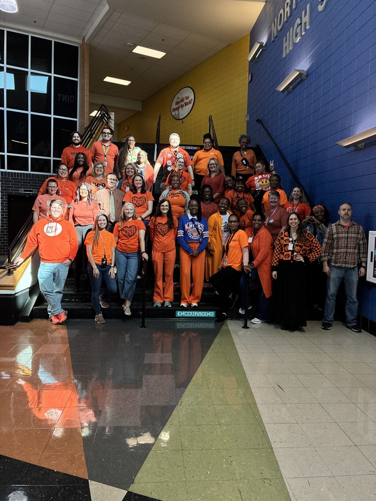 North Point staff wearing orange 