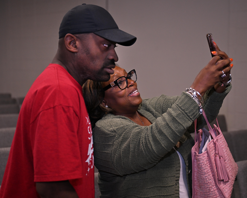 man and women taking a picture