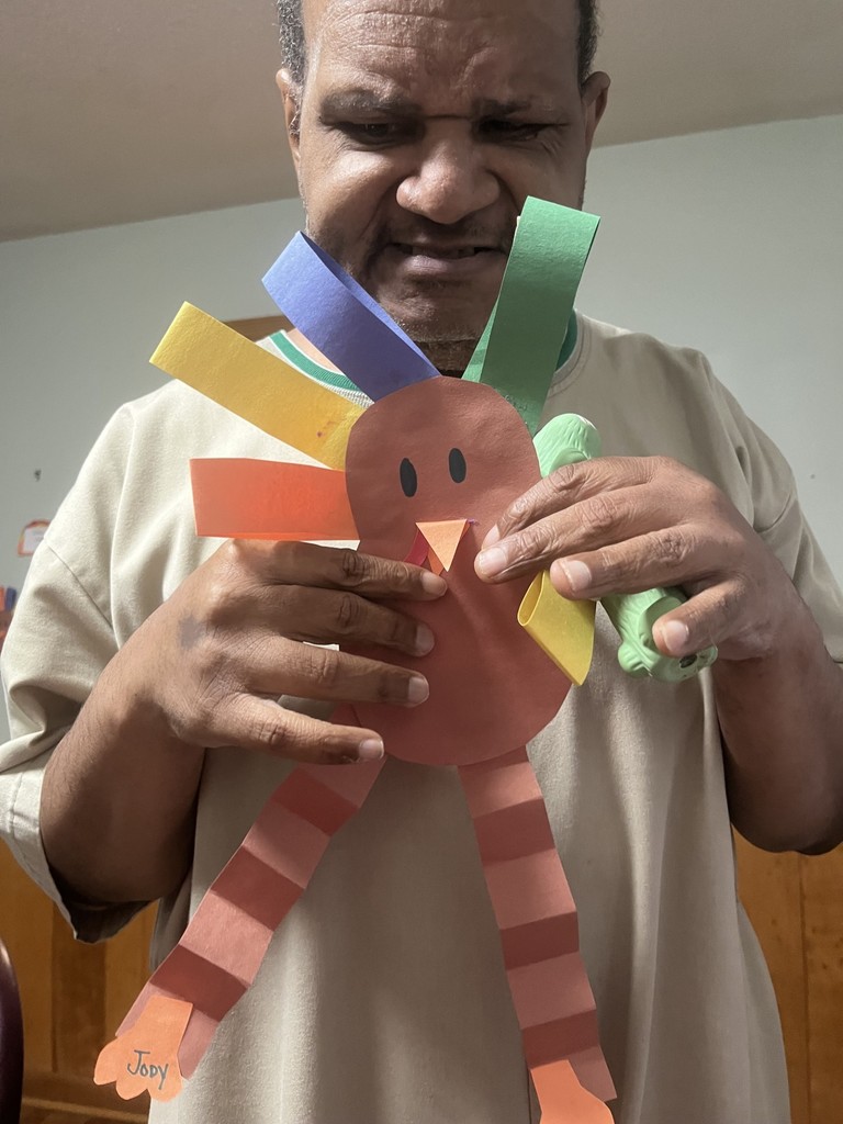 man holding turkey he crafted
