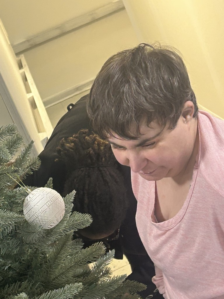 woman decorating tree