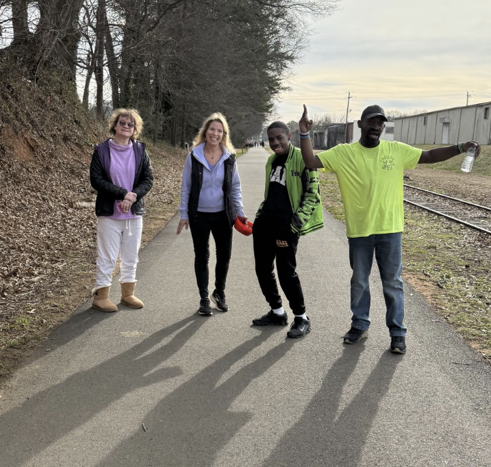 Group of four people outside