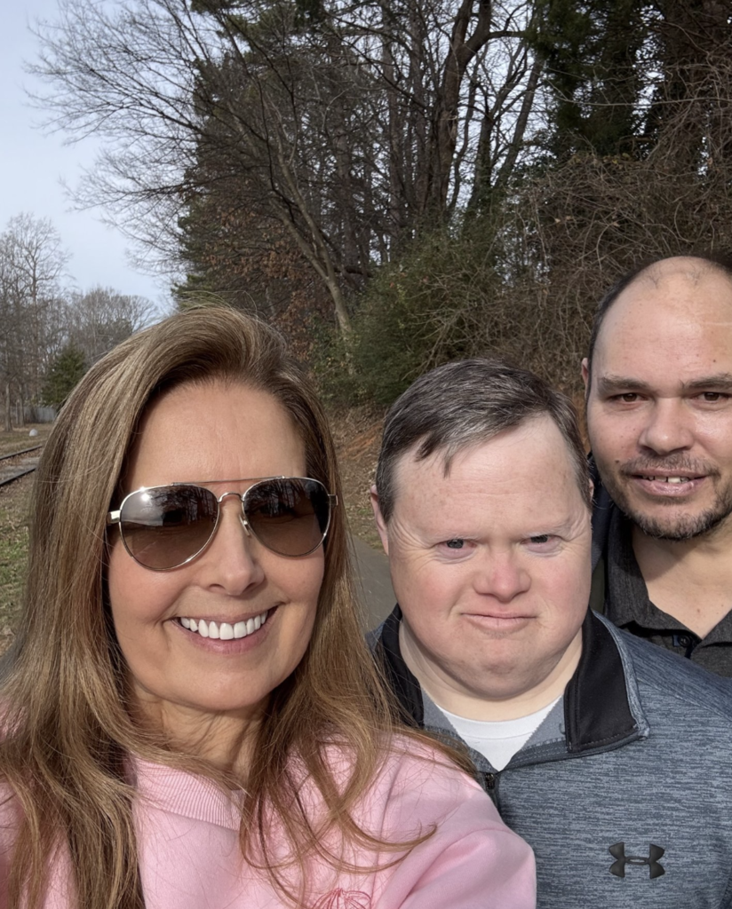 Three people outside