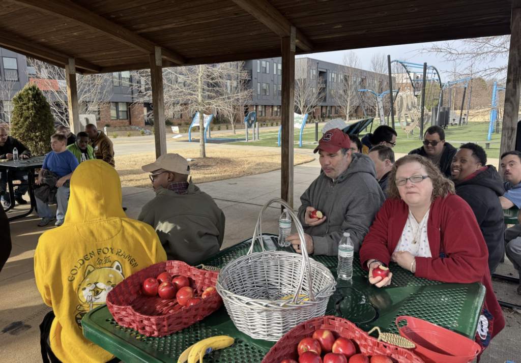 A group of people under a pavialion