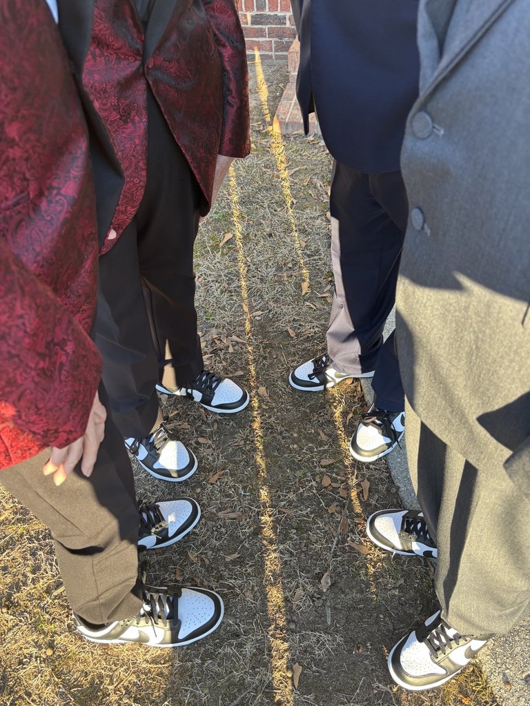 men showing off shoes