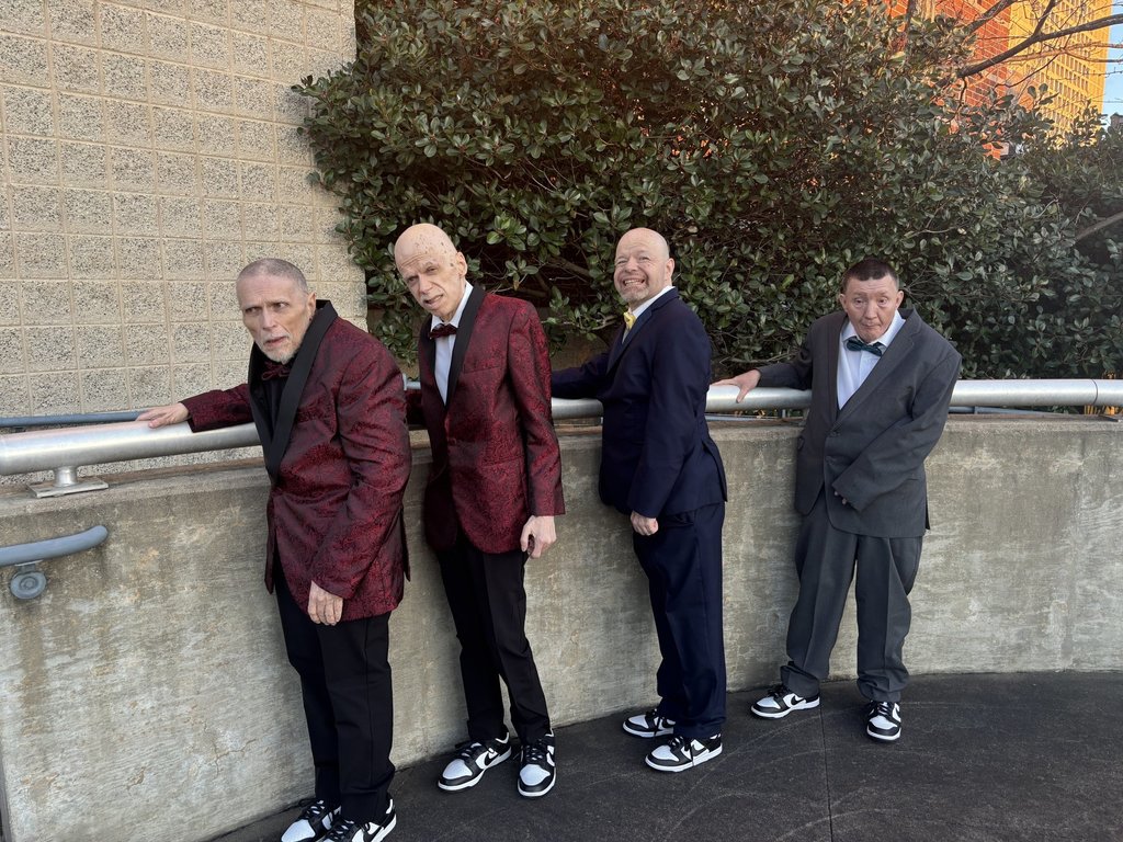 Group of men ready to go to a dance
