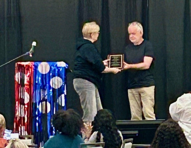 Jerry Bernard receiving award