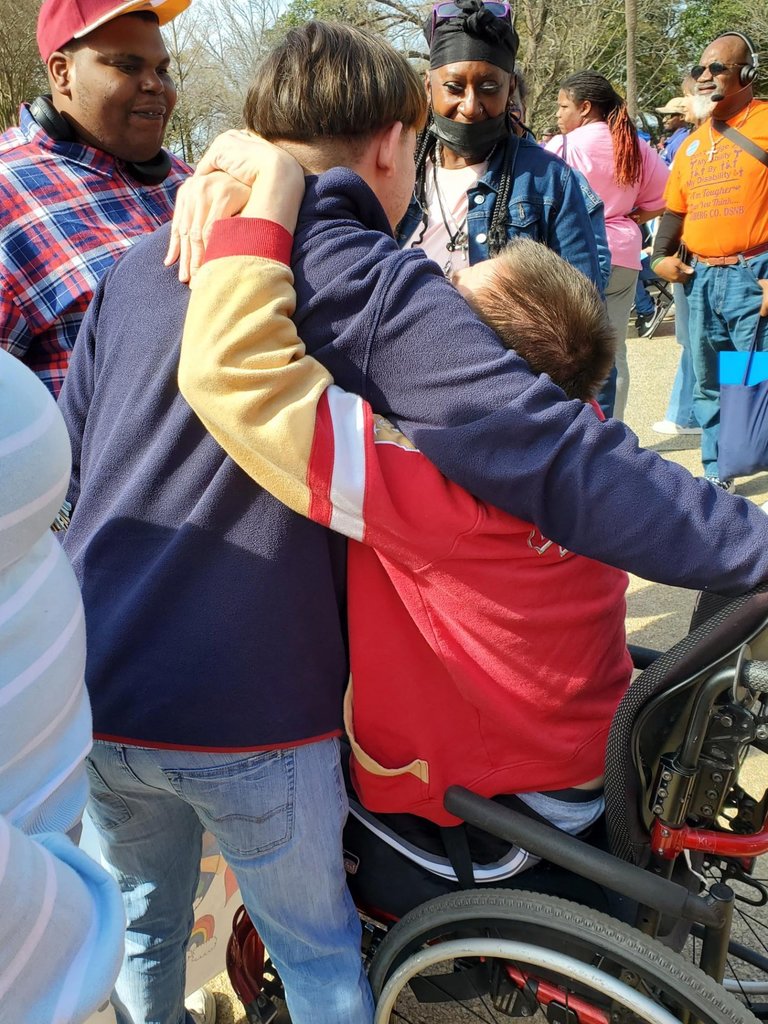 Friends greeting each other at the statehouse