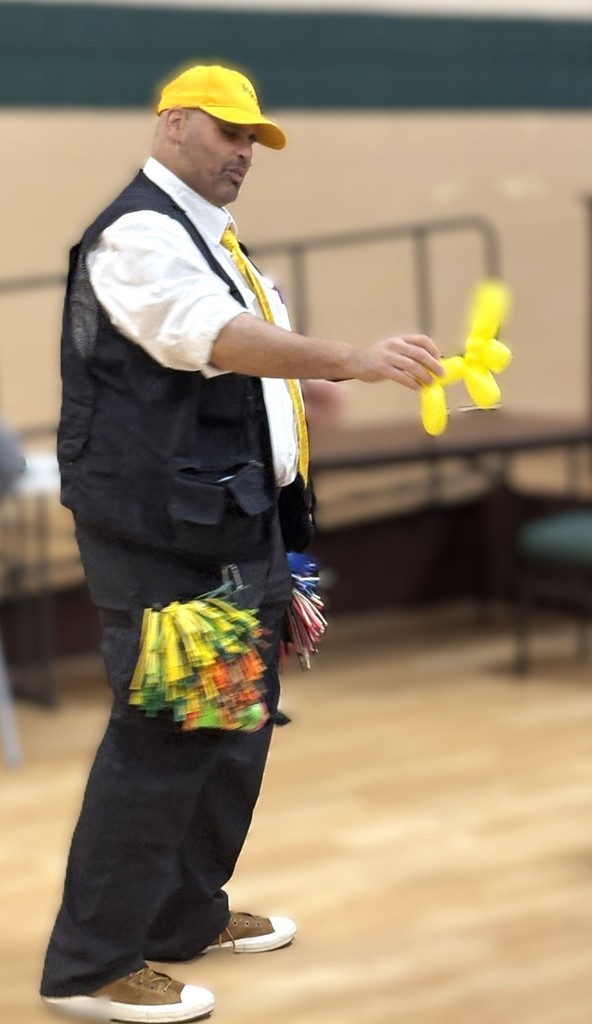Man with yellow balloon