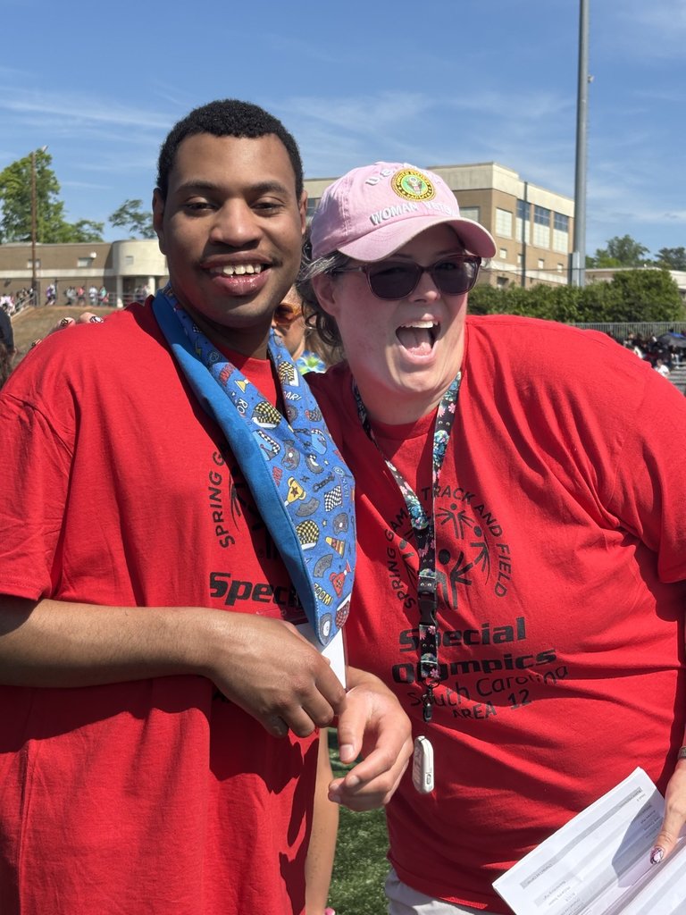 a man and a woman smiling
