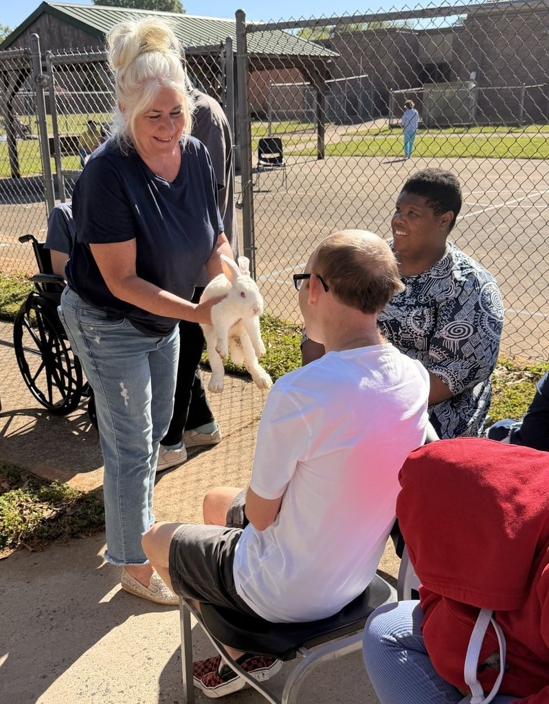 Lady and men with a bunny