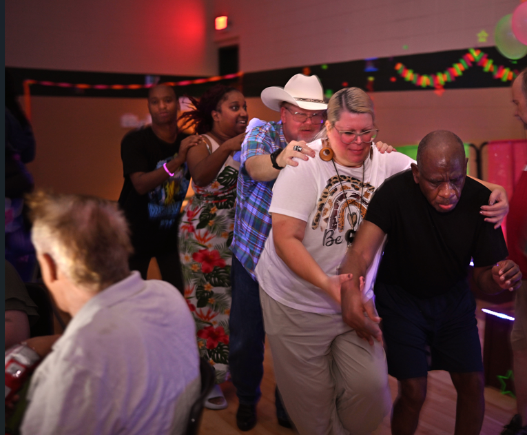 Congo line of men and woman