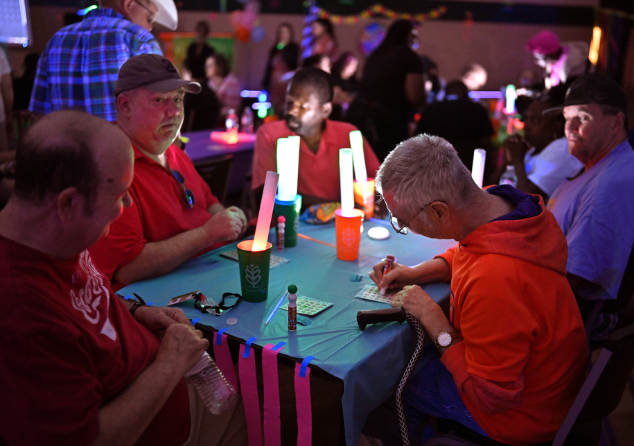 Table of people playing bingo