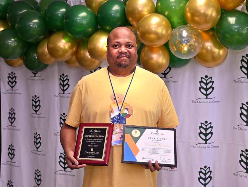 Derrick Perason with awards