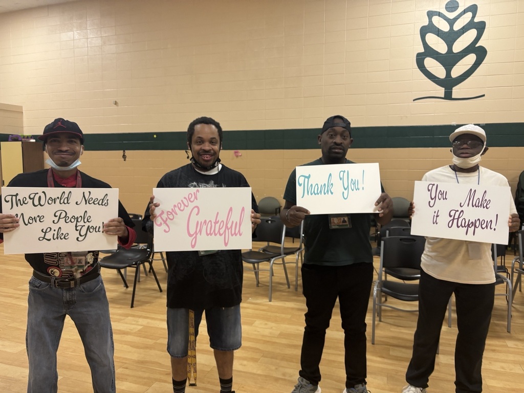 4 men with signs