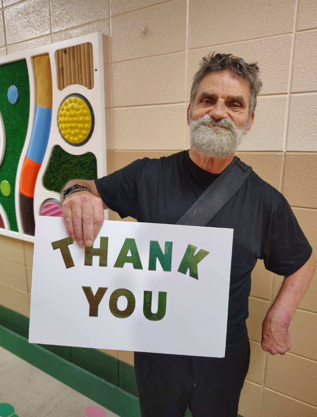 Man with sign