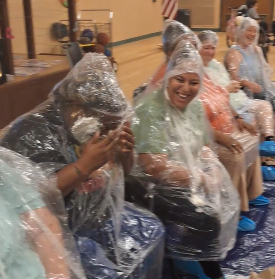 women with pie in face