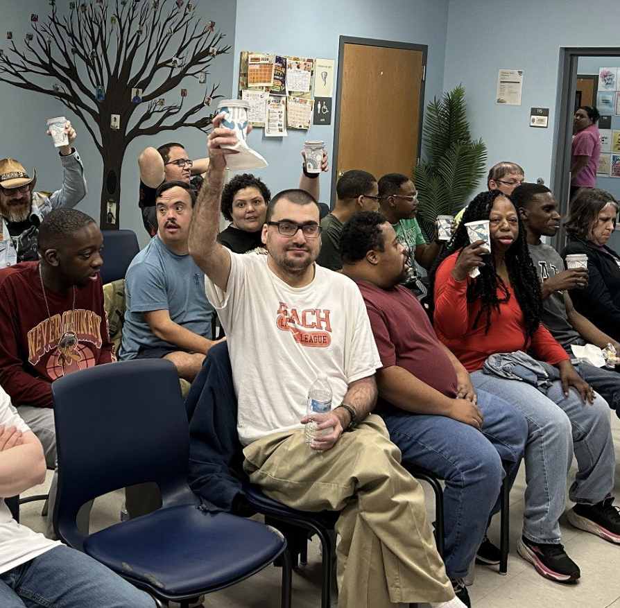 group shot of people drinking coffee