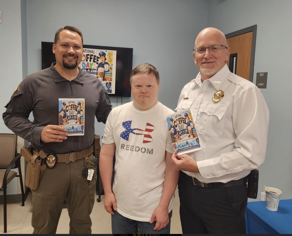 2 policemenr and an individual