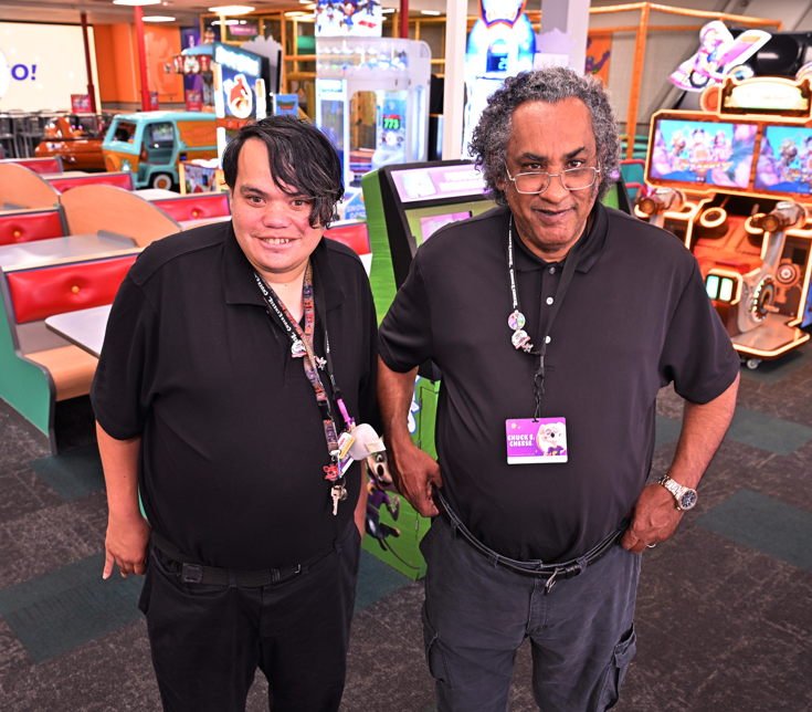 Two men at ChuckECheese