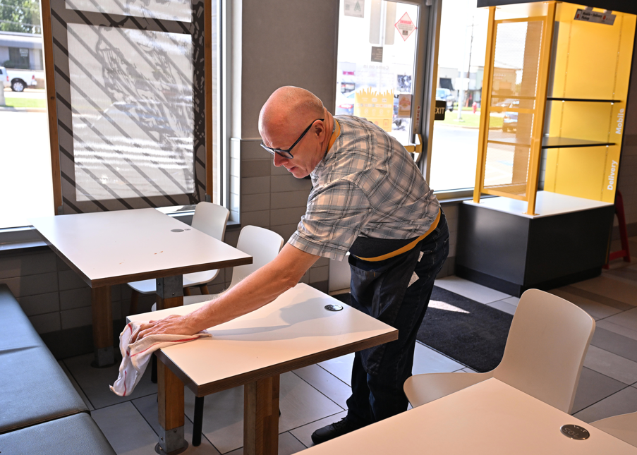 Jimmy wiping tables