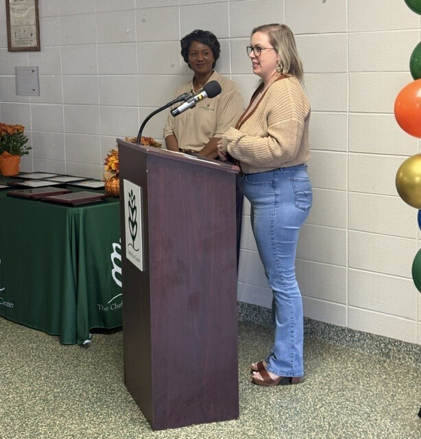 2 people at the podium